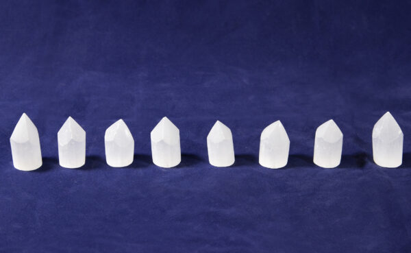 Selenite Point Towers line up in row