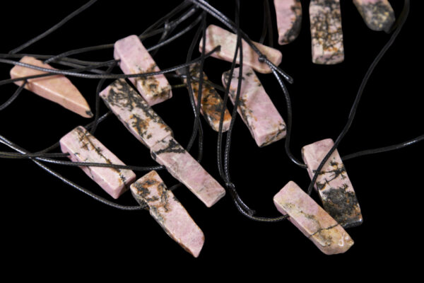 Pile of Rhodonite necklaces