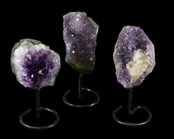 Three Amethyst Stones on a Stand
