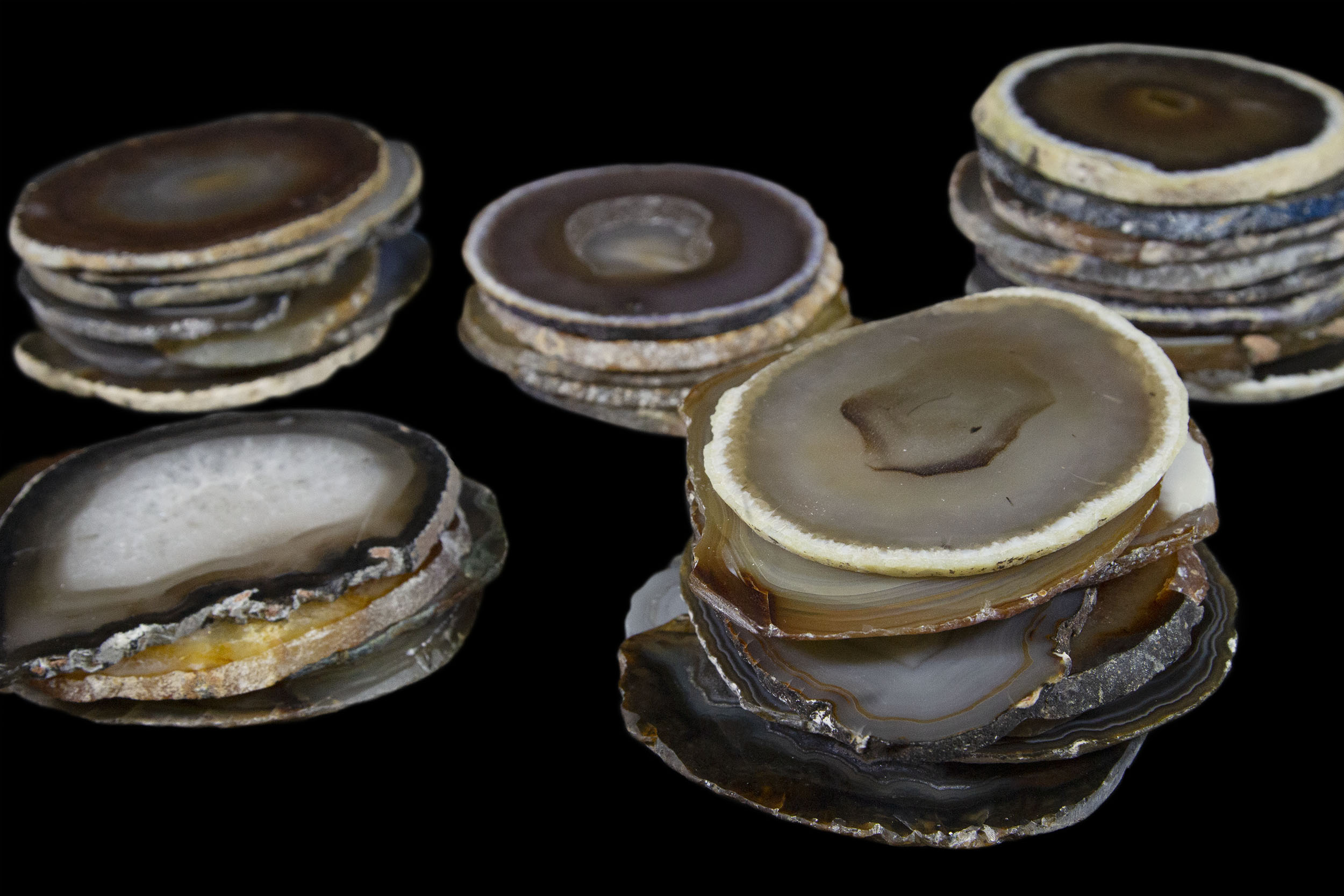 stacks of natural agate coasters