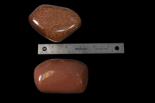 goldstone with ruler to scale