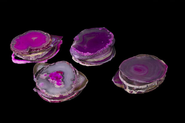 stacks of pink agate coasters