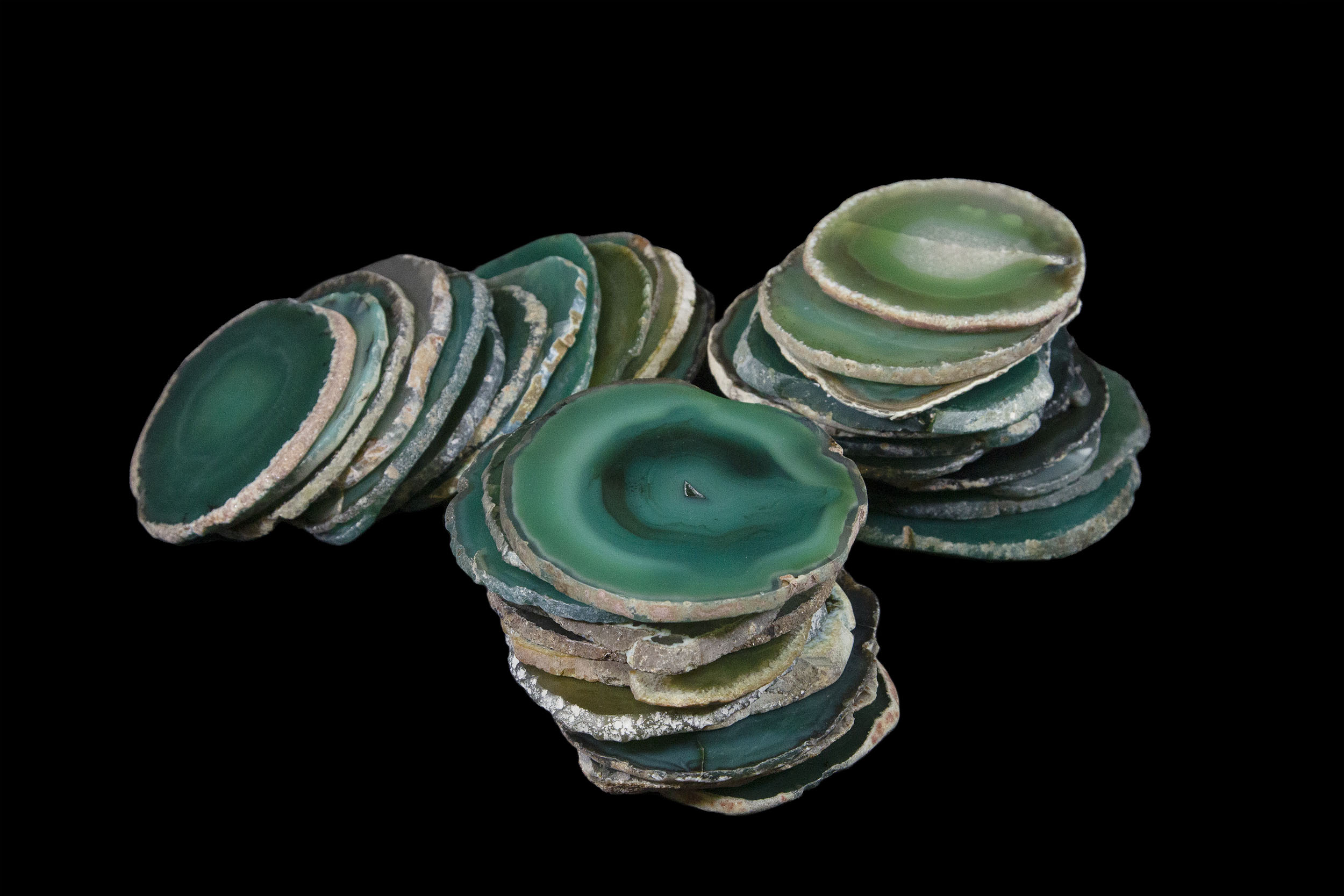 stacks of green agate coasters