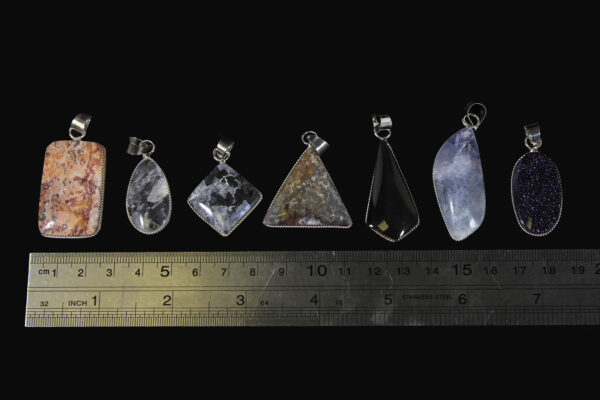 Assorted Gemstone Pendants of various shapes with ruler