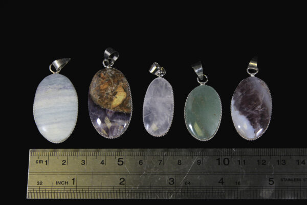 Assorted Oval Pendants with ruler