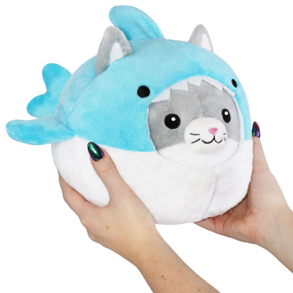 Hands holding Undercover Kitty in Shark