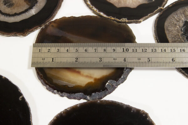 black agate coasters with ruler to show size
