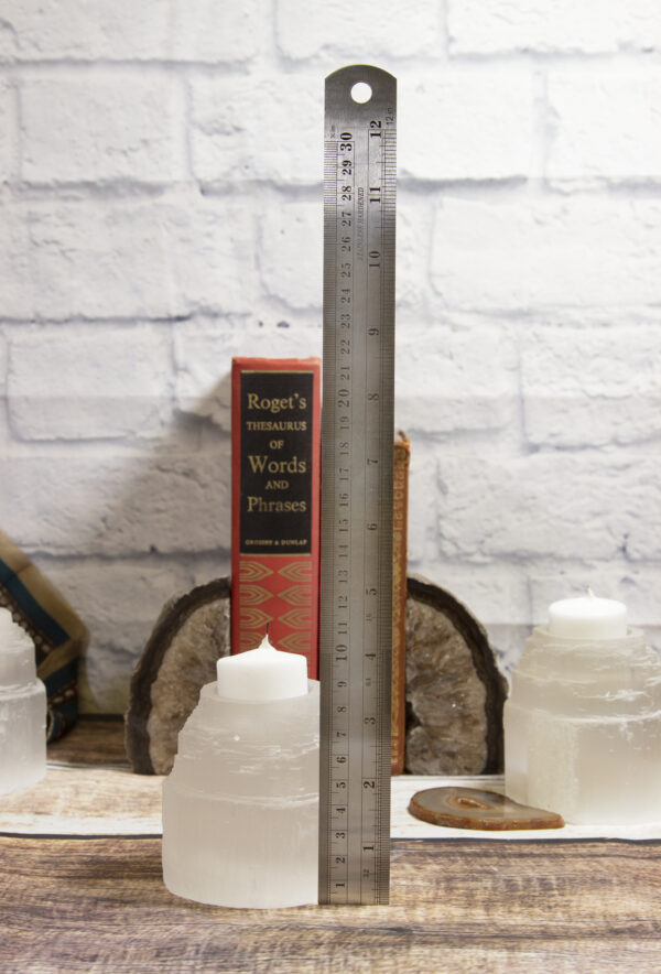 selenite candle holder with ruler to show size