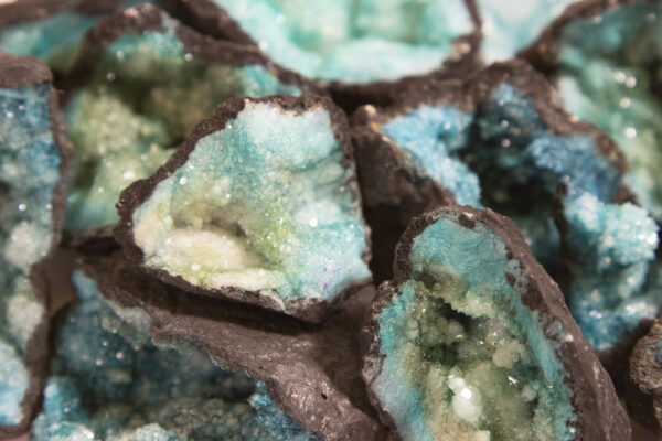 assorted small teal dyed geodes close up