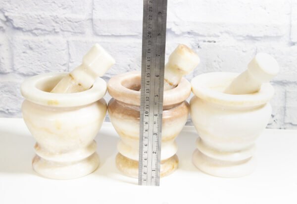 large white onyx mortar and pestles with ruler to show scale