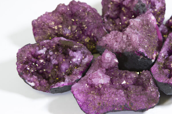 Large purple dyed open geodes close up