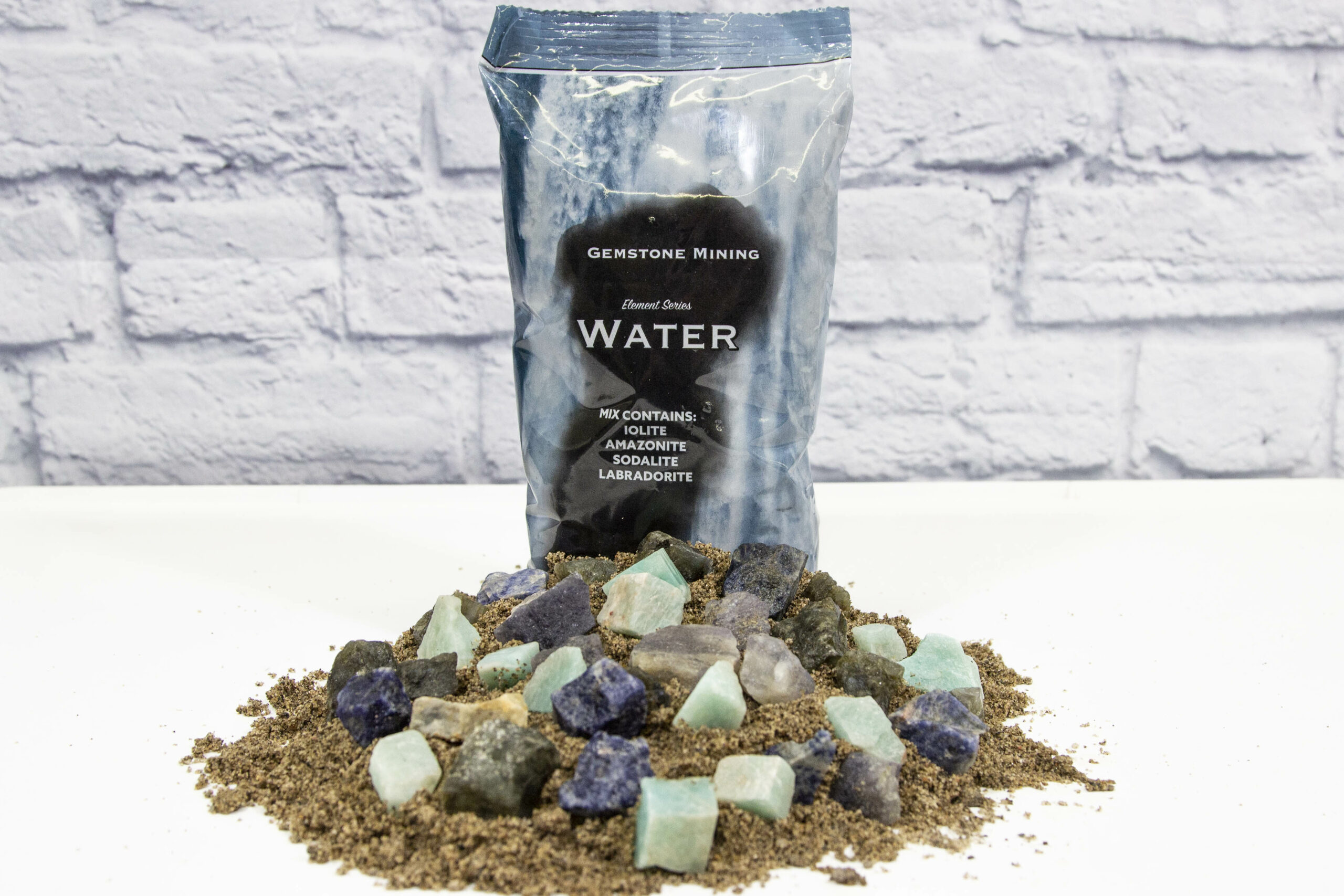 Water Bag (Element Series) with stones in sand