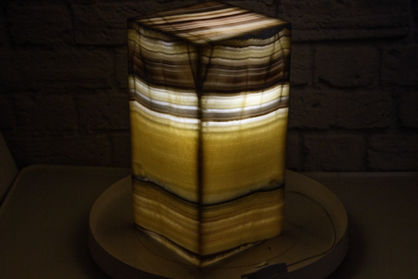 Honey Black Onyx Pedestal Lamp with Light on side view