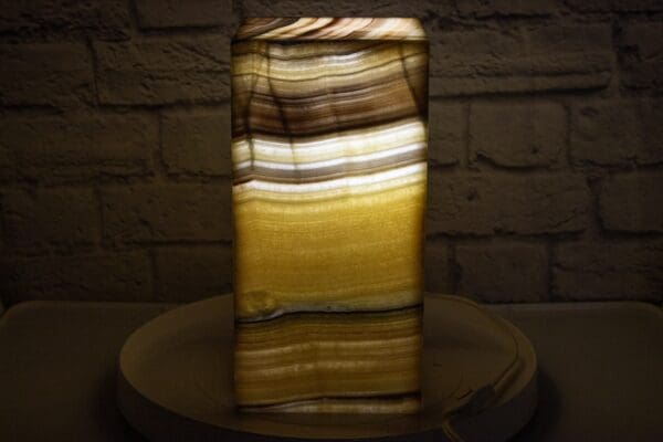 Honey Black Onyx Pedestal Lamp with Light On