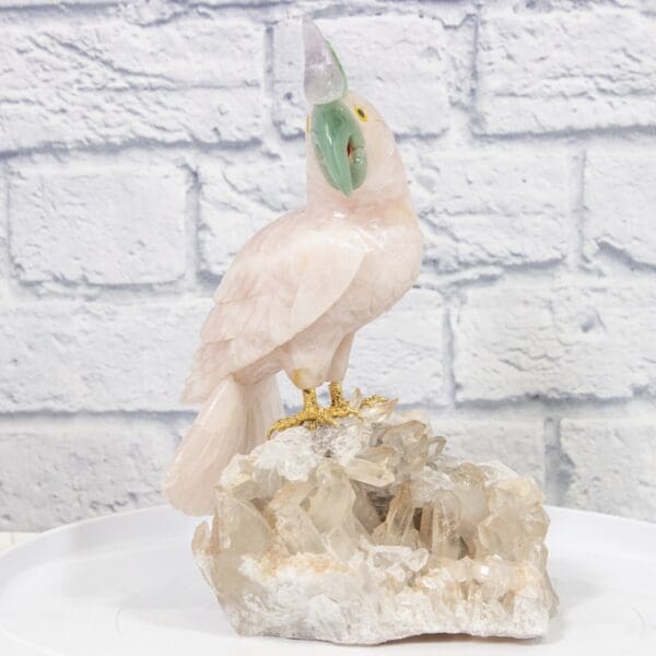 Hand Carved Rose Quartz Parrot, on Crystal Base