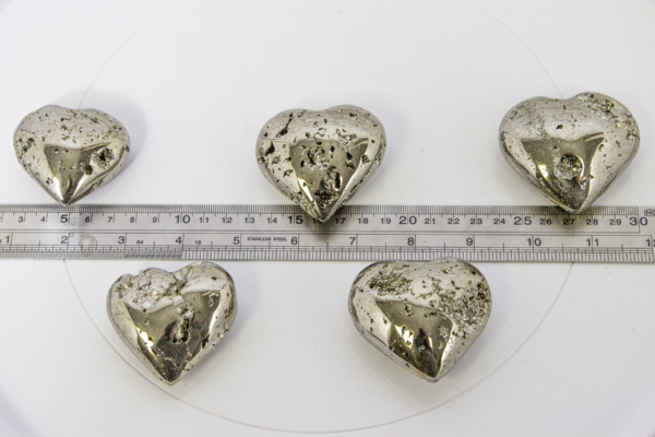 Five Pyrite Hearts 2" next to Ruler for measuring