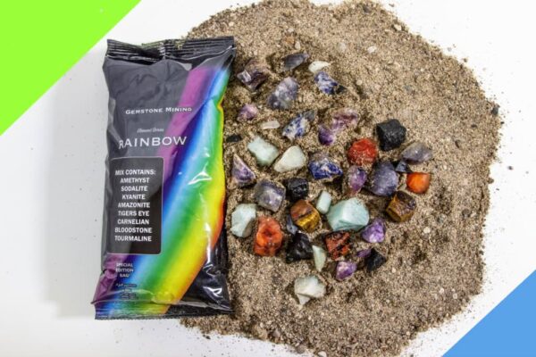 gemstone mining bag,called rainbow bag, laid out displaying the gemstones in the bag.
